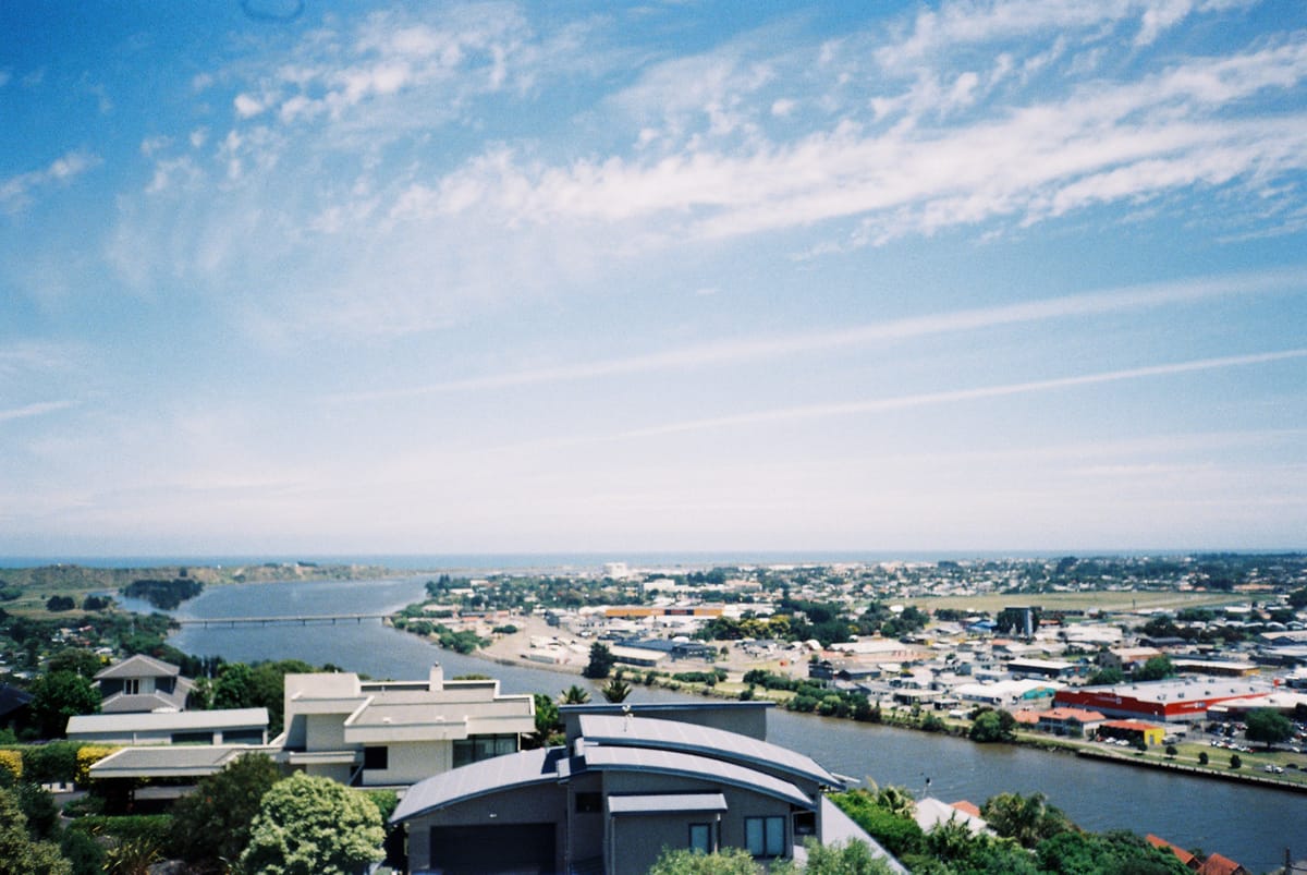 A landscape shot of Whanganui and the Whanganui away on a sunny day.